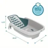 The 4-in-1 Reclining Newborn to Toddler Baby Tub - White provides essential back support.