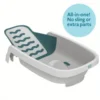 The 4-in-1 Reclining Newborn to Toddler Baby Tub - White provides essential back support.